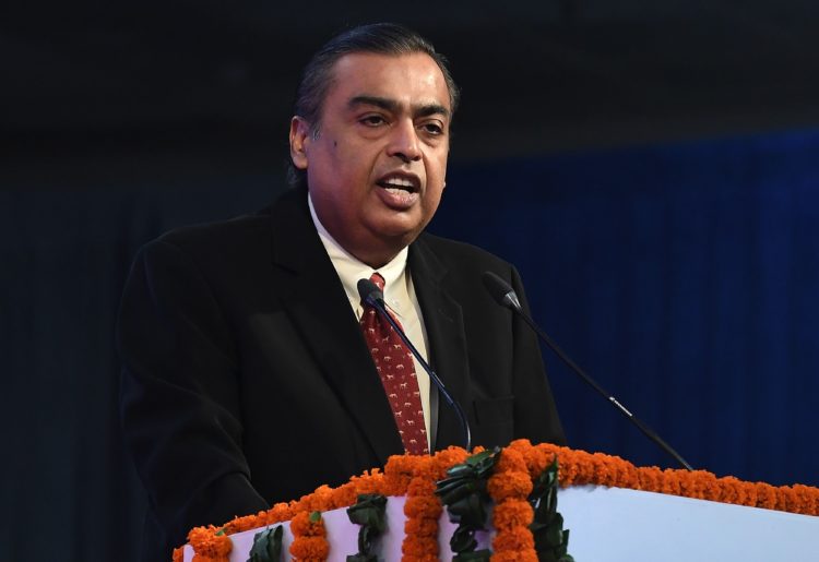 The rainmaker behind Mukesh Ambani’s $13 billion deal spree