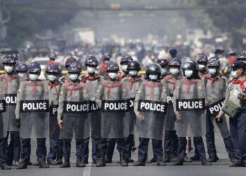 Myanmar police and military kill at least 18 people after opening fire on protesters, UN says