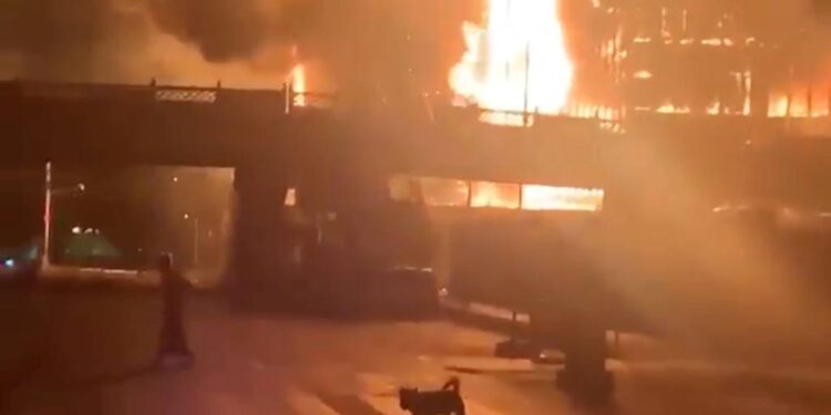 Myanmar coup latest: Military-owned buildings catch fire under curfew