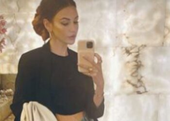 Michelle Keegan flashes toned abs on rare date night out with Mark Wright